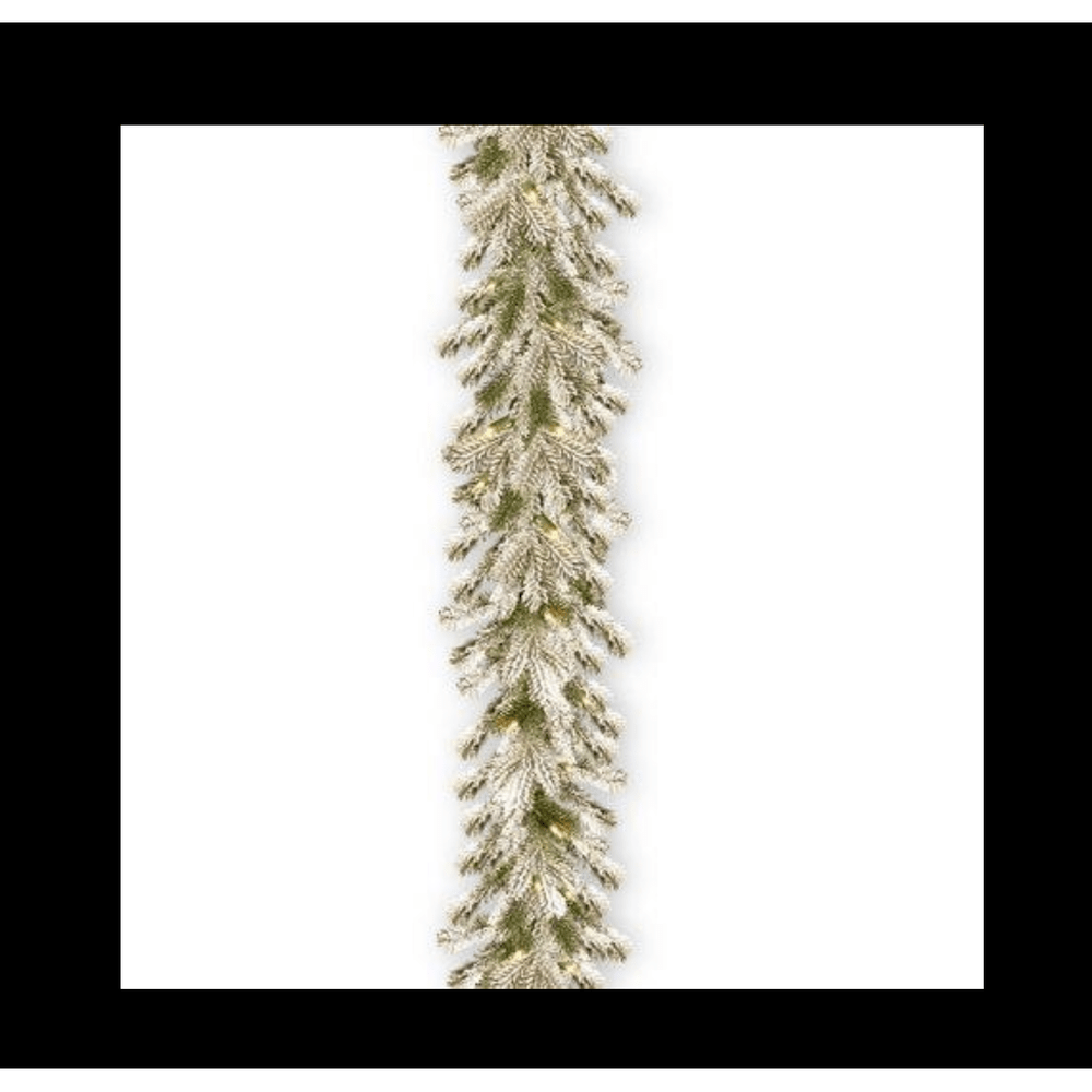 9 Ft. Snowy Sheffield Spruce Garland with Clear Lights